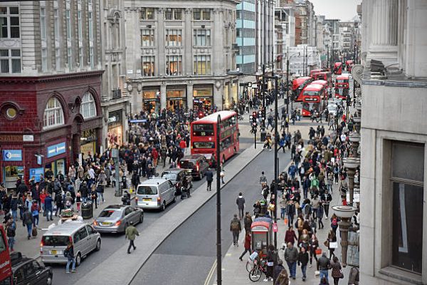 London, UK - February 19th 2016: A view from a high vantage point along London's main retail area Oxford Street, with public, shops and London buses